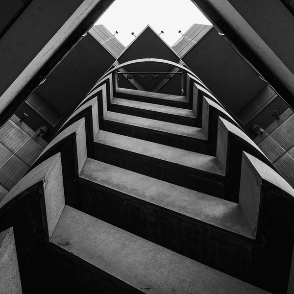 Low angle black and white view of striking Atlanta architecture showcasing modern design.